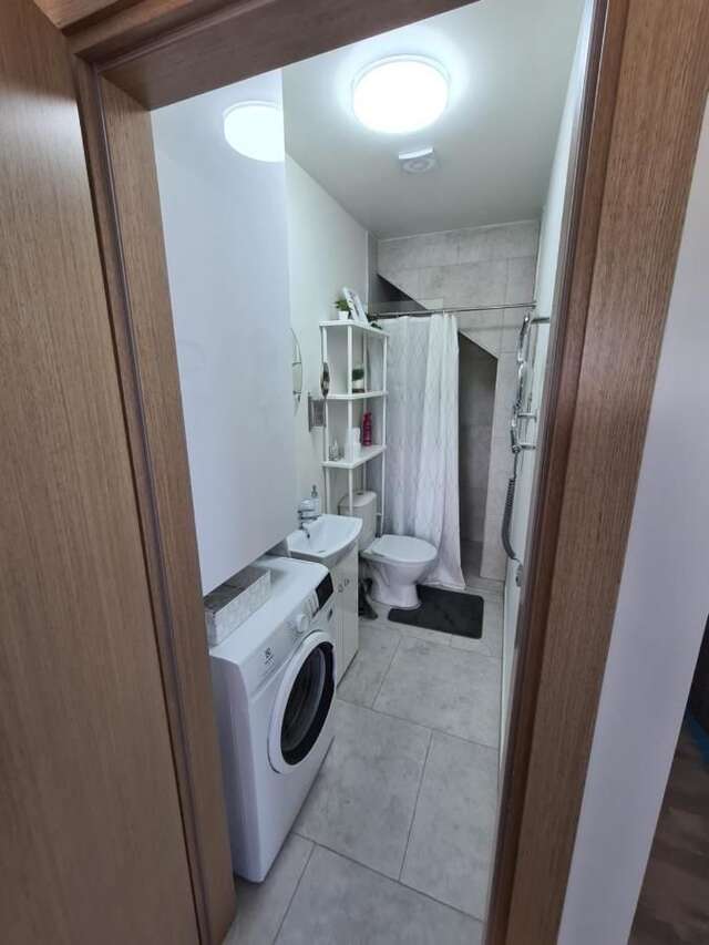 Апартаменты Vaivorykštės 7D apartamentai (su baseinu) Паланга-12